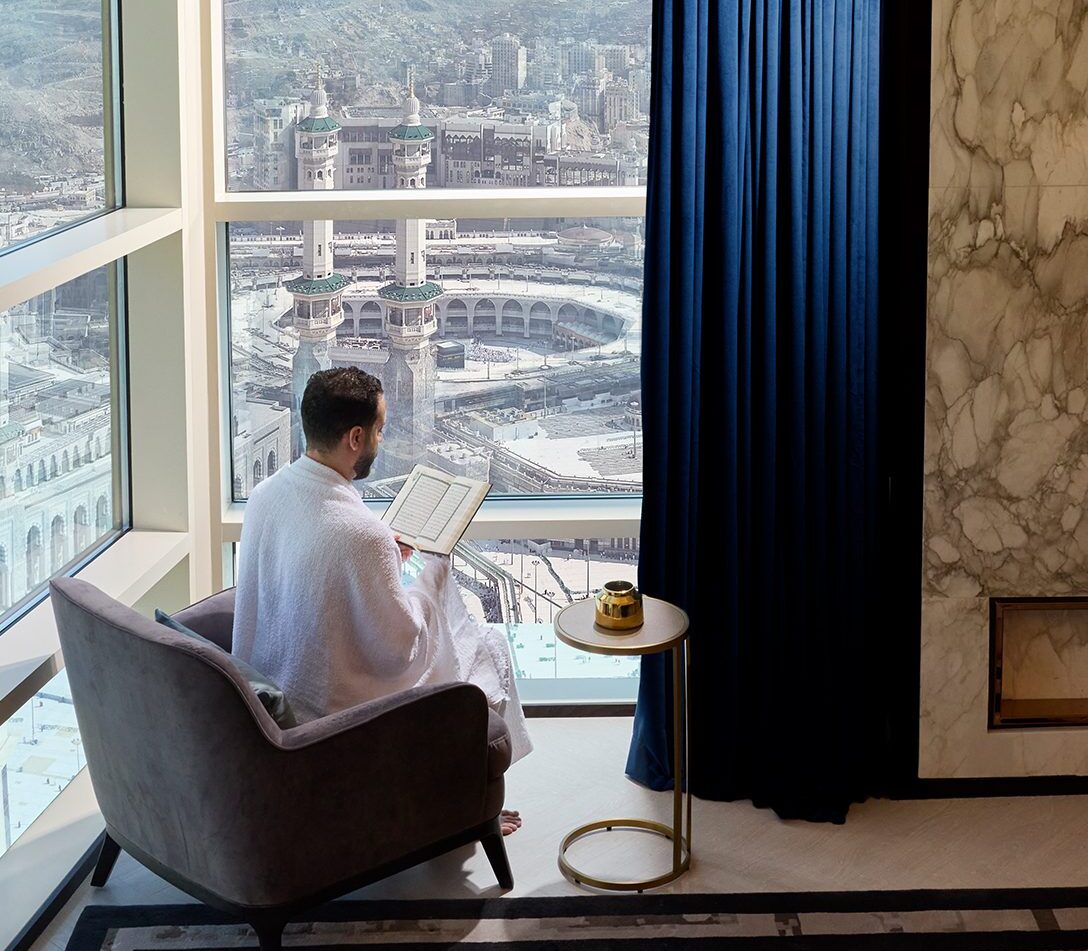 Guest reading with a view of Kaaba from Address Jabal Omar Makkah