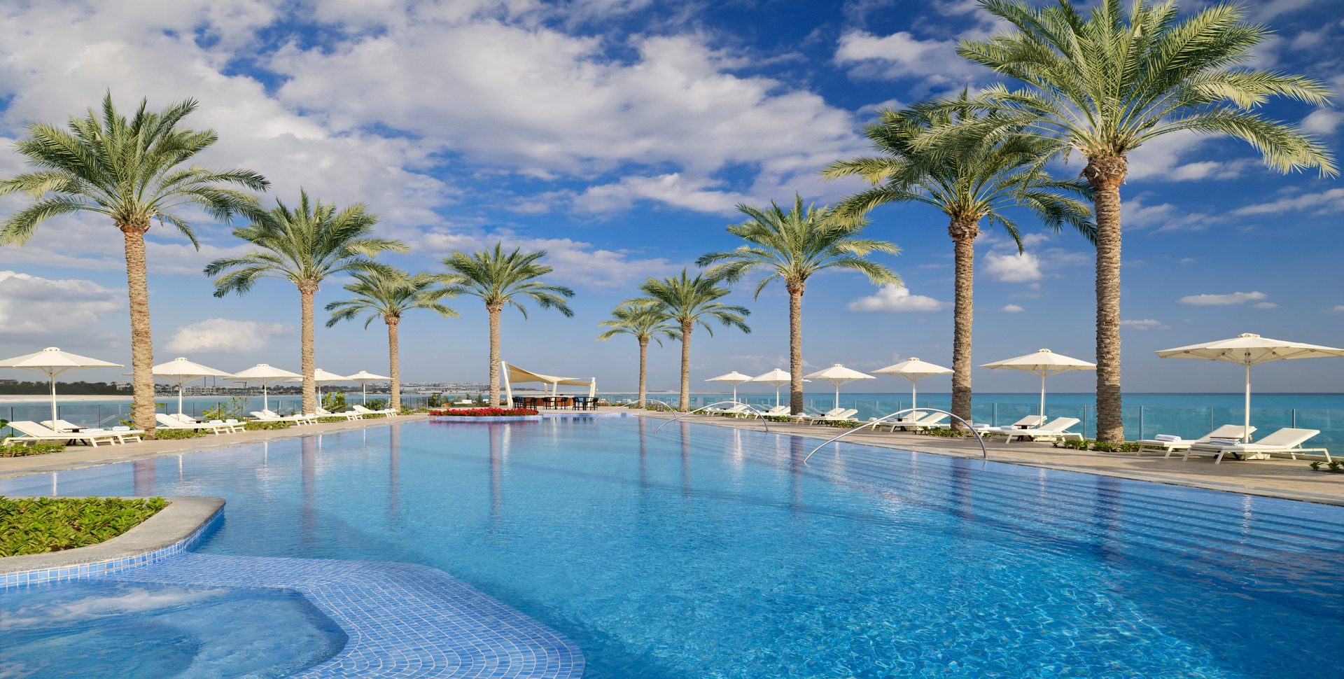 Infinity swimming pool with beach views at Address Beach Resort Marassi